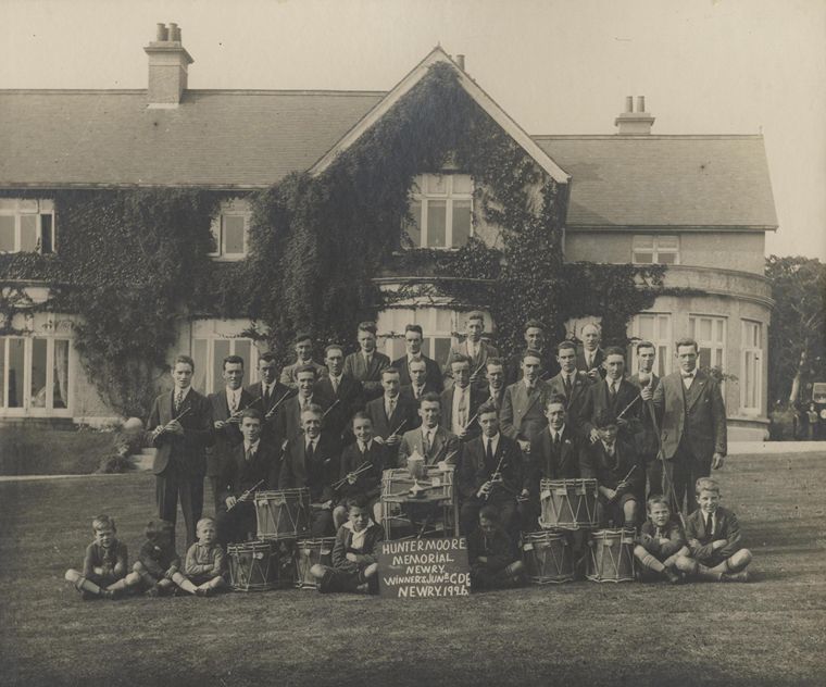 The Hunter Moore Memorial Flute Band, photographed at Moore Lodge after winning the prestigious All-Ireland Junior Flute Band Championship in September 1926 Newry and Mourne Museum Collection The Hunter Moore Memorial Flute Band, photographed at Moore Lodge after winning the prestigious All-Ireland Junior Flute Band Championship in September 1926 Newry and Mourne Museum Collection